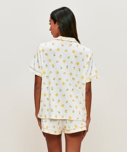Short en jersey c&ocirc;tel&eacute; avec motifs soleils et citrons ;